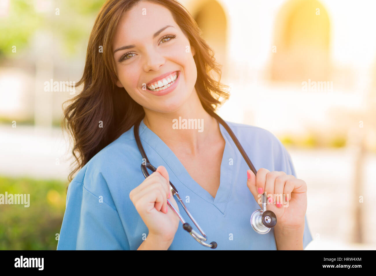 Nurse wearing scrubs hi-res stock photography and images - Alamy