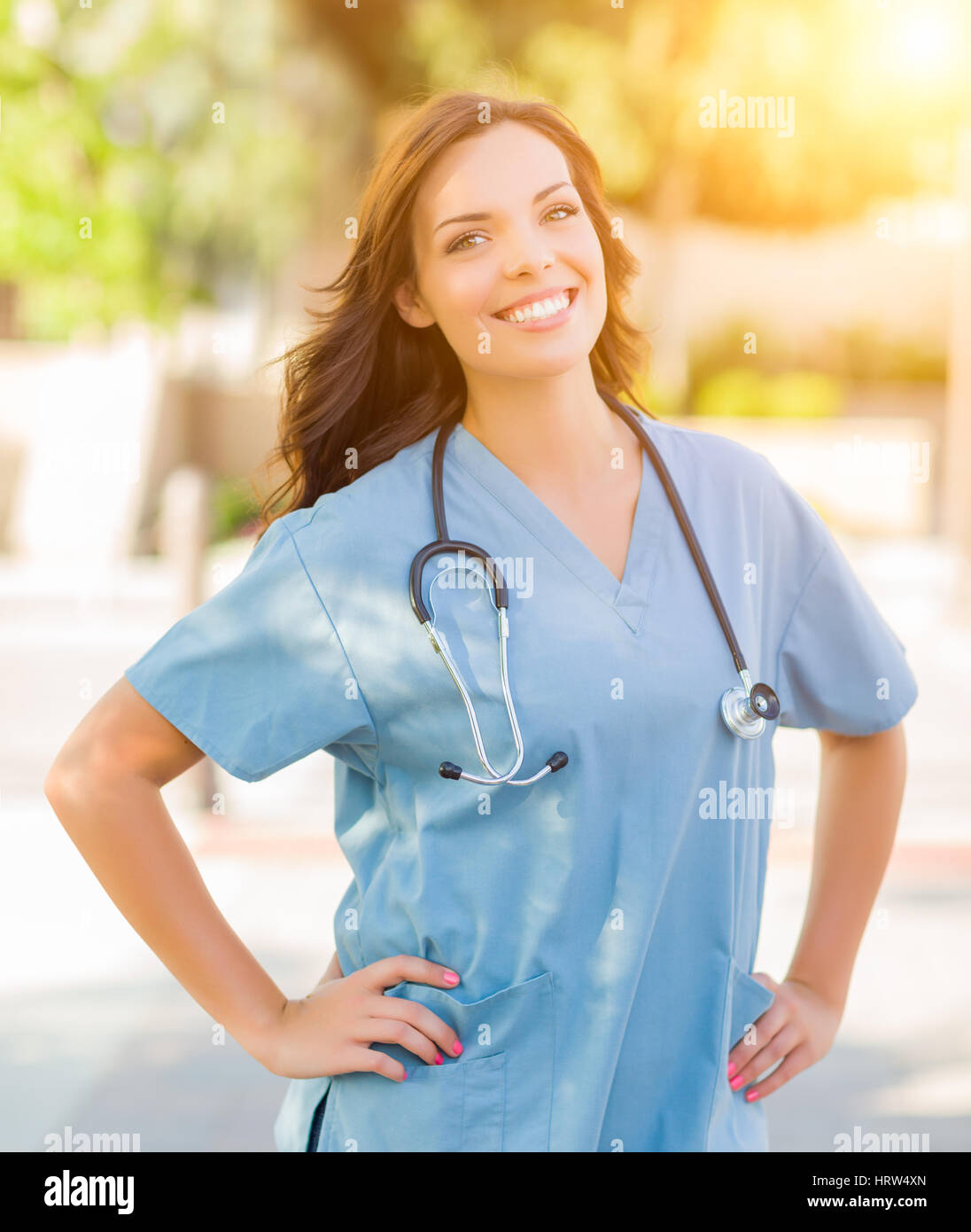 Portrait young nurse in scrubs hi-res stock photography and images - Alamy