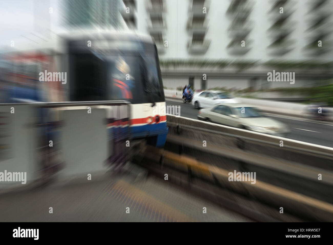 Abstract camera zoom of electric train in daytime. Stock Photo