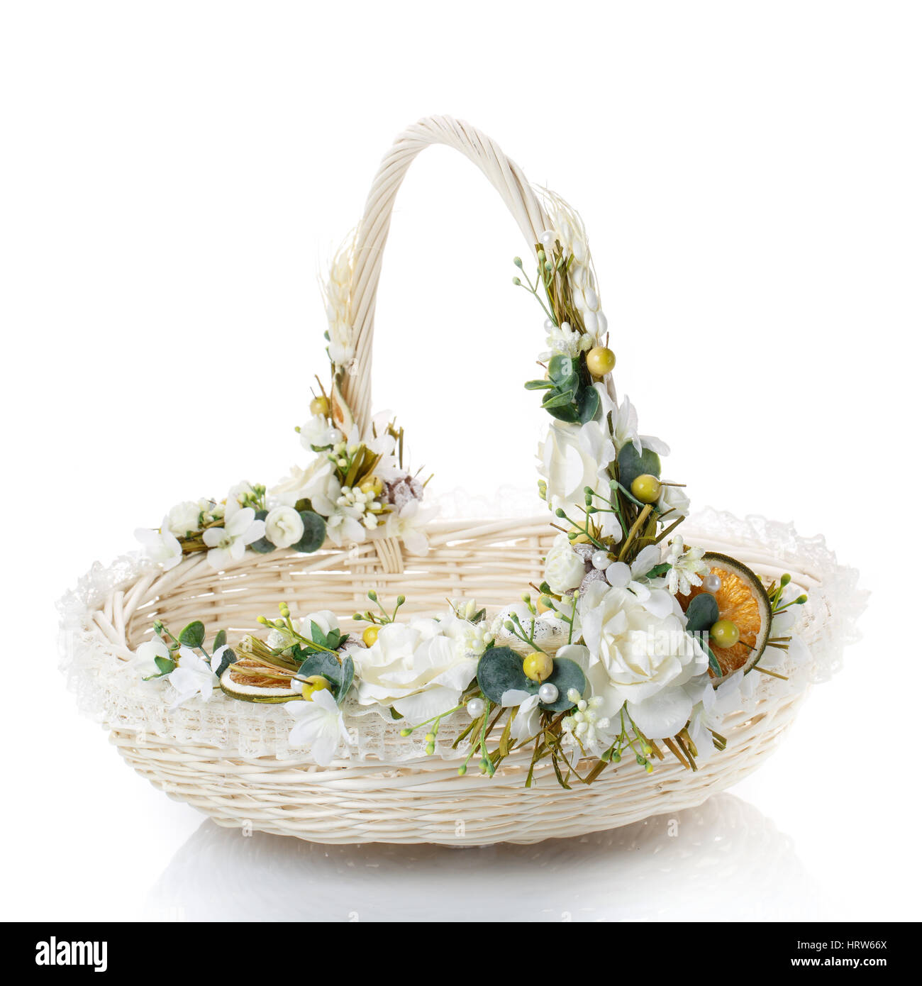 beautifully decorated empty wicker basket on a white background Stock Photo