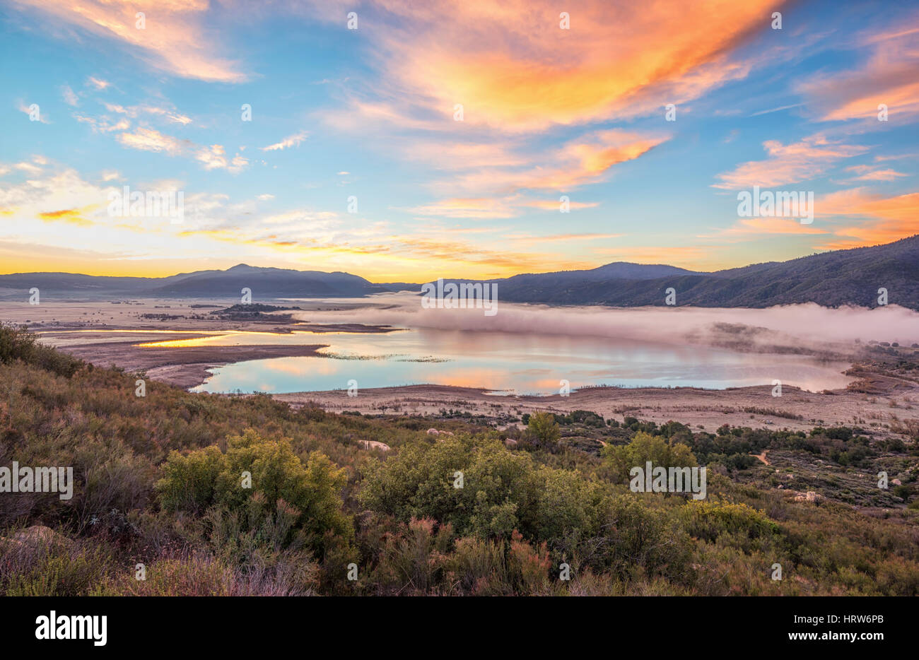 Vibrant sunset and landscape view of Lake Henshaw. San Diego County, California, USA Stock Photo 