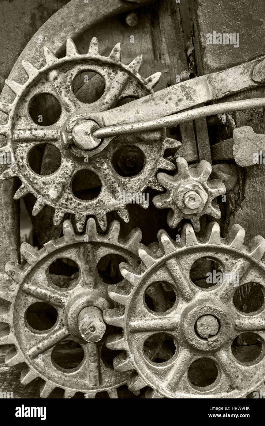 old dirty industrial mechanism with rusty gearwheels Stock Photo