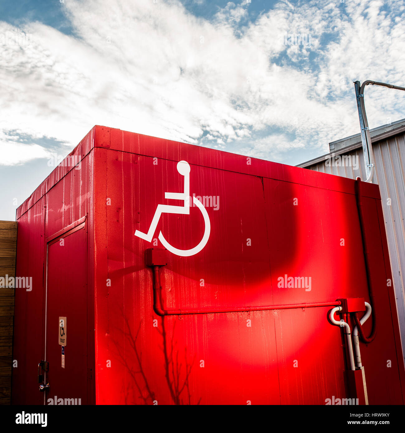A shipping container re-purposed as a disabled toilet. Stock Photo