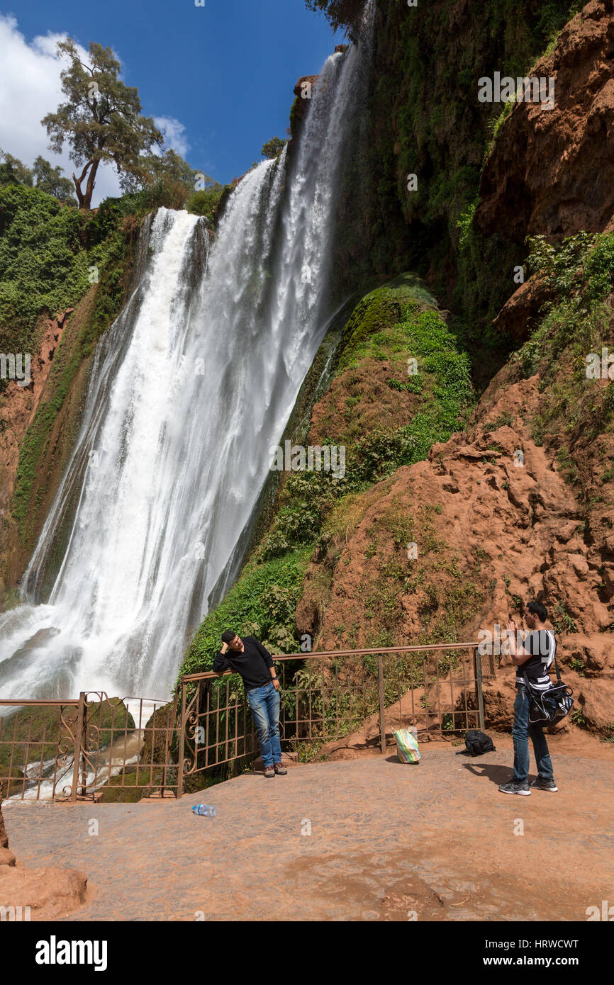 Falls of Ouzoud, Cascades d'Ouzoud, Morocco.  Moroccan Tourists Taking Photos. Stock Photo
