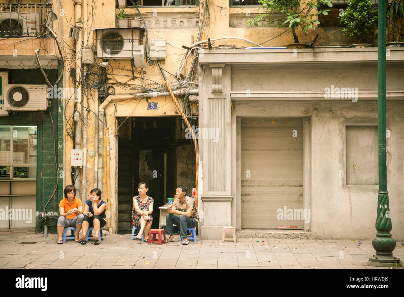 Hanoi, Vietnam April 25, 2014 Local people rest on the plastic