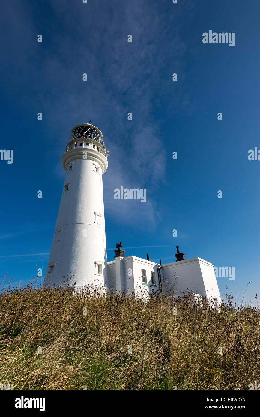 Flamborough lighthouse at Flamborough head on the coast of North Yorkshire, England. A well known landmark on the east coast. Stock Photo