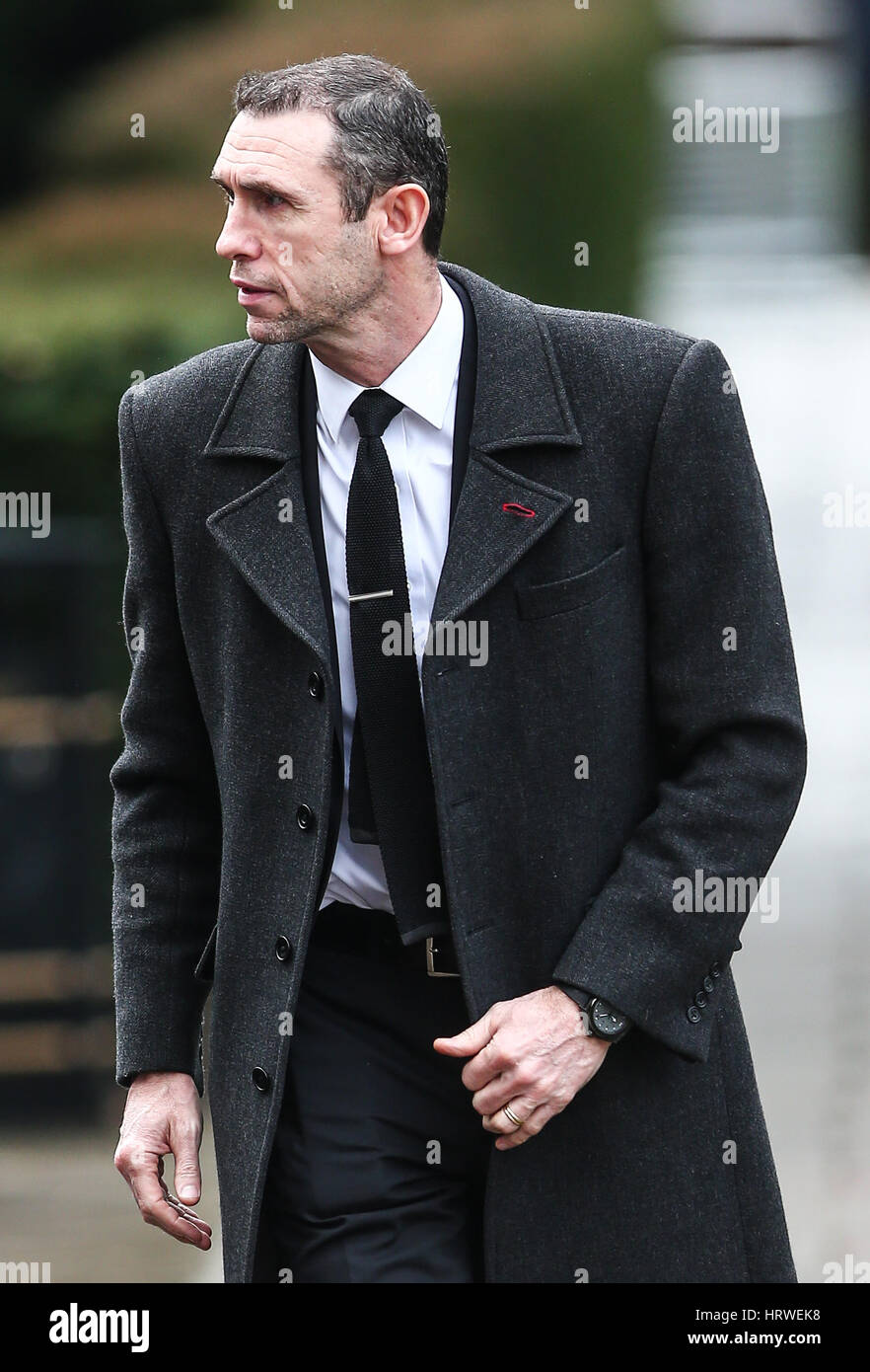 The funeral of ex-England manager Graham Taylor takes place at St. Mary's Church in Watford. Taylor managed Watford FC twice, famously during the time the club was owned by Elton John. He also managed Aston Villa and Wolves.  Featuring: Martin Keown Where Stock Photo