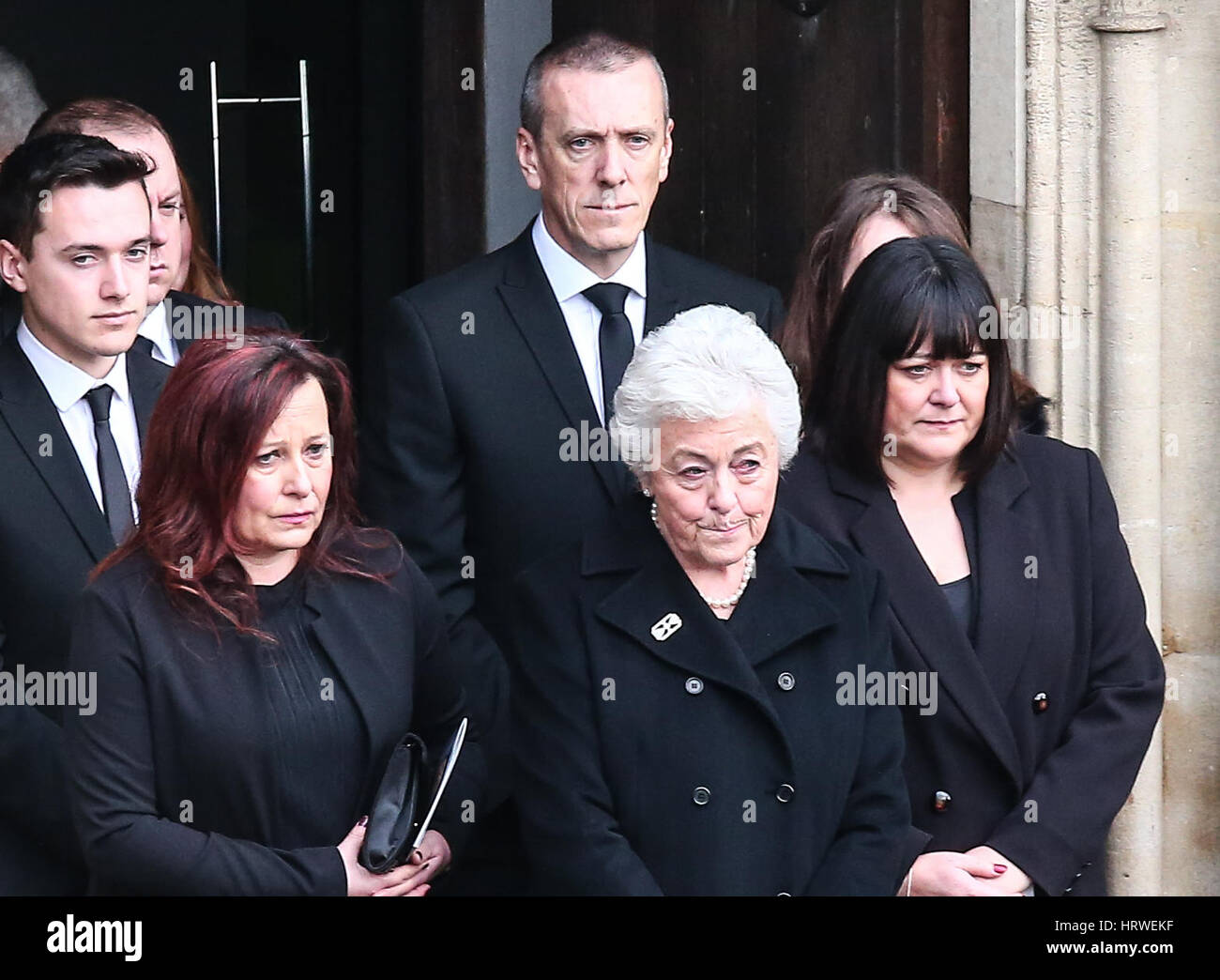 The funeral of ex-England manager Graham Taylor takes place at St. Mary's Church in Watford. Taylor managed Watford FC twice, famously during the time the club was owned by Elton John. He also managed Aston Villa and Wolves.  Featuring: The Taylor family Stock Photo