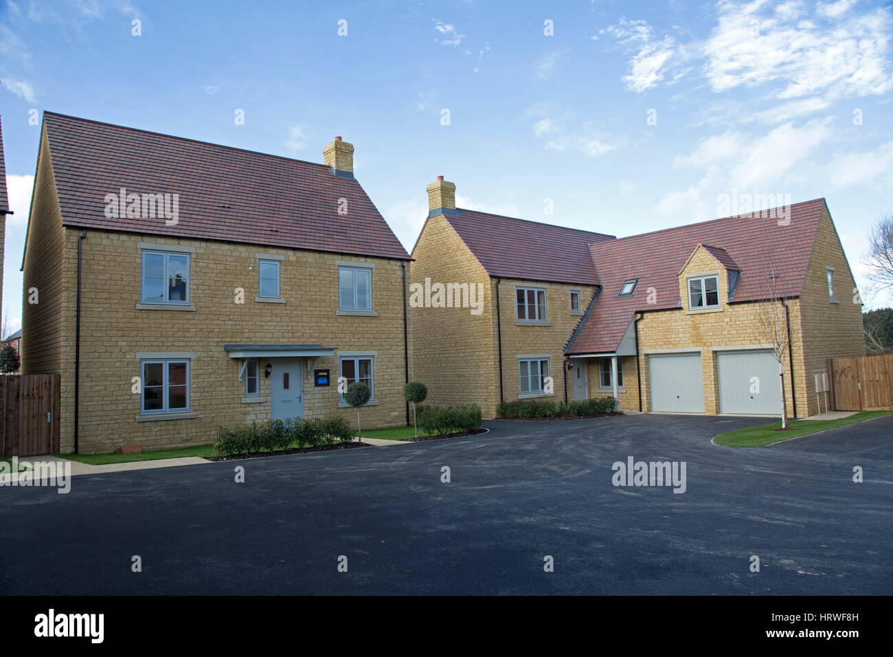 New Cotswold stone family homes Mickleton; current new building in several local sites will soon double the size of this small attractive Cotswold vil Stock Photo