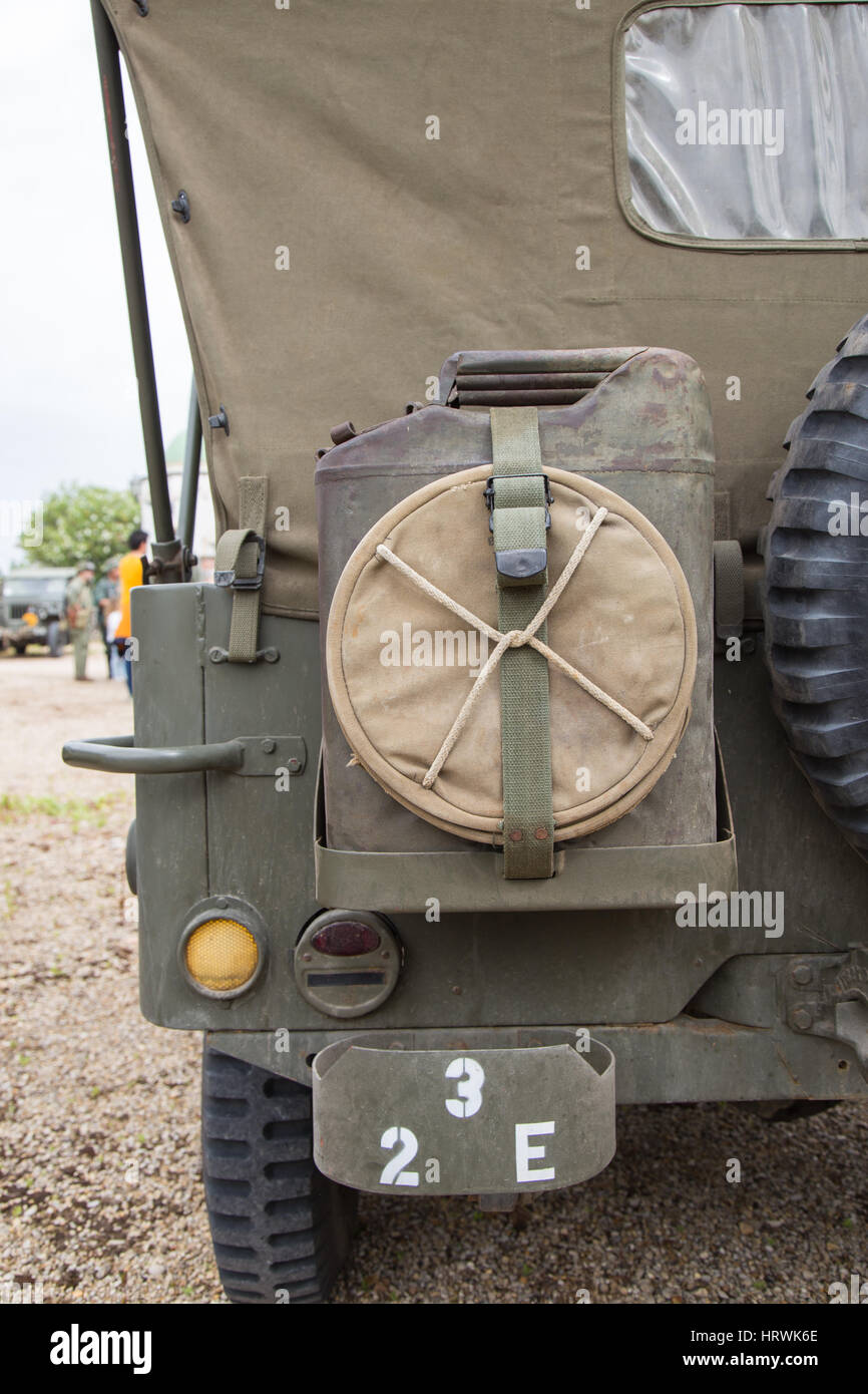 Metal fuel container behind a military means Stock Photo - Alamy