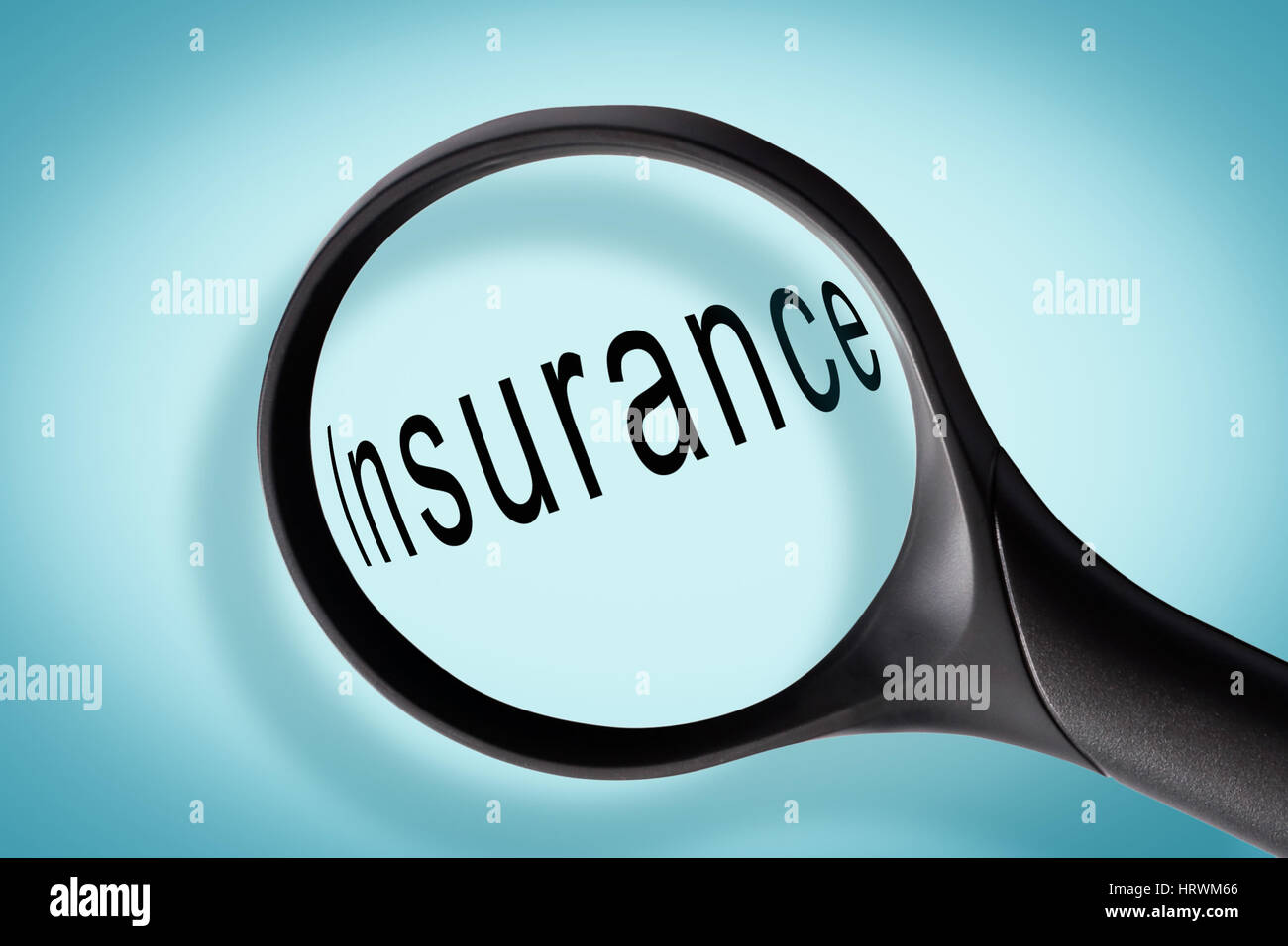 Word insurance seen through a magnifying glass, insurance concept Stock Photo