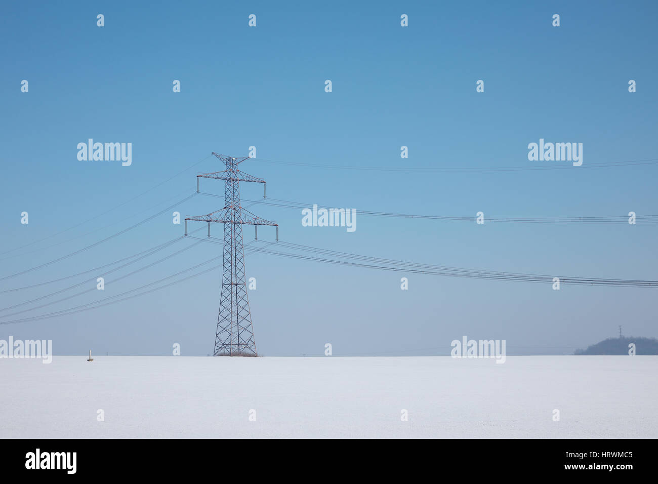 high voltage pylons in winter on a sunny day Stock Photo - Alamy