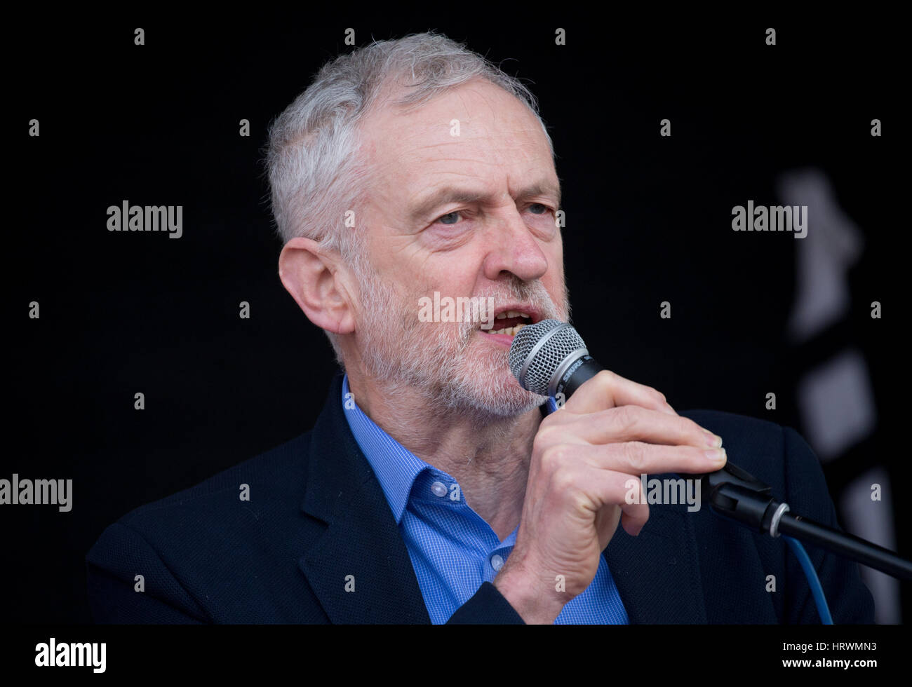 Labour leader,Jeremy Corbyn,addresses nurses,junior doctors and health workers at a rally in Parliament Square against the cuts by the government Stock Photo