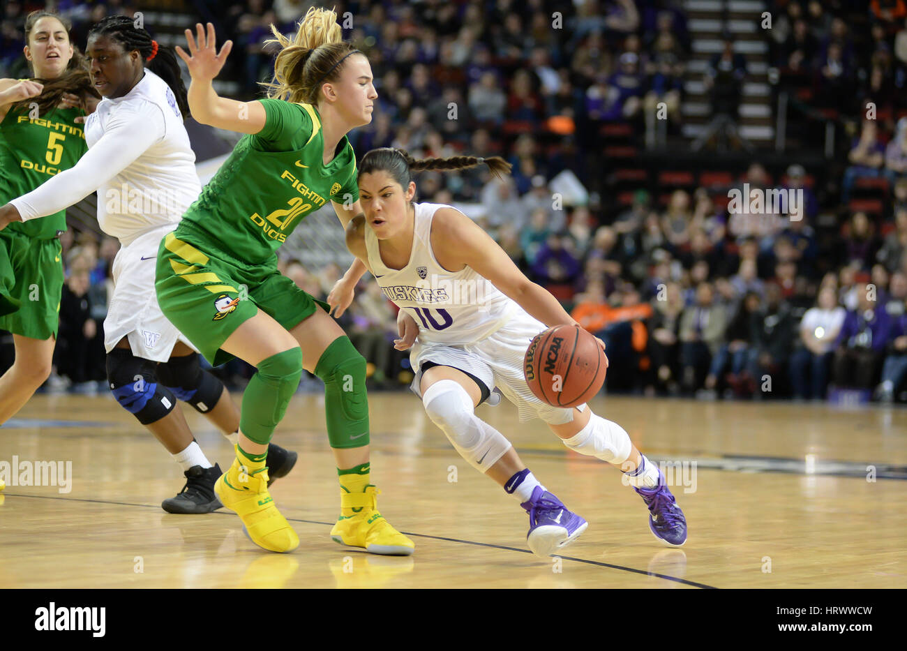 March 3, 2017: Oregon's Sabrina Ionescu (20) defends against Washington's Kelsey Plum (10) during a PAC12 women's tournament game between the Washington Huskies and the Oregon Ducks. The game was played at Key Arena in Seattle, WA. Jeff Halstead / CSM Stock Photo