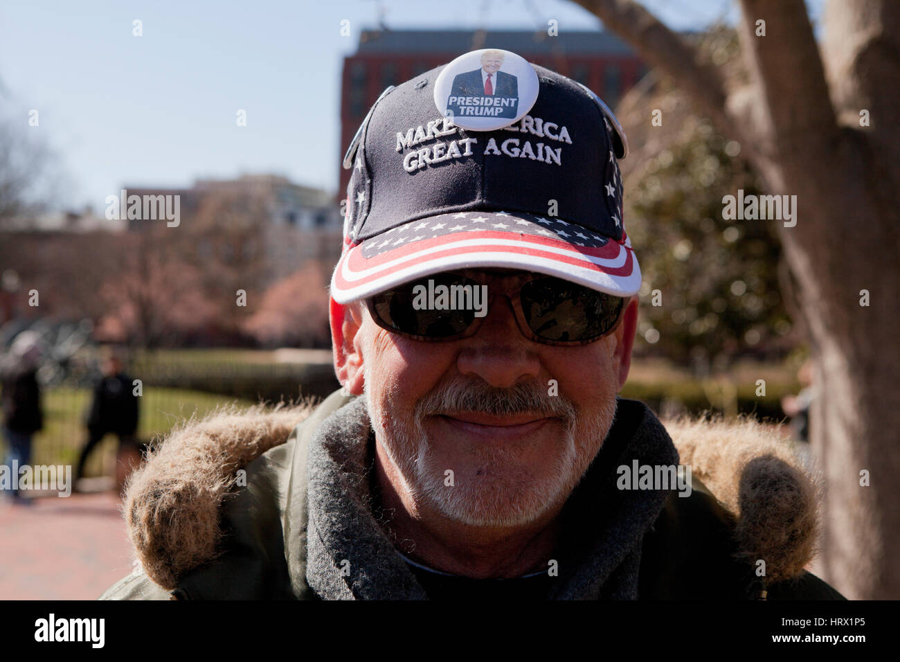 Washington, DC, USA. March 04, 2017. The 'Spirit of America' rally draws a small crowd in front of the White House to voice their support of president Donald Trump. Credit: B Christopher/Alamy Live News Stock Photo