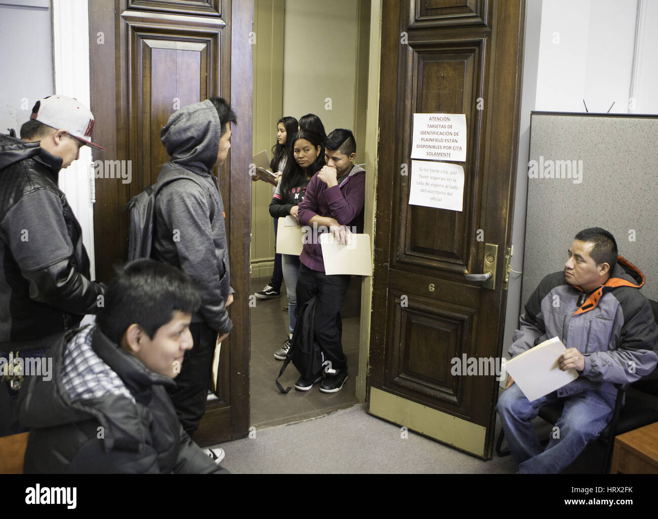 Plainfield, Plainfield, USA. 4th Mar, 2017. UNDOCUMENTED IMMIGRANTS wait in line to get a city identification card at the Plainfield, New Jersey City Hall. Last February the City of Plainfield proclaimed a resolution designating the city as a fair and welcoming community. The City's Clerk office registered nearly 800 immigrants with their ID program since February, 'officials said. Credit: Brian Branch Price/ZUMA Wire/Alamy Live News Stock Photo