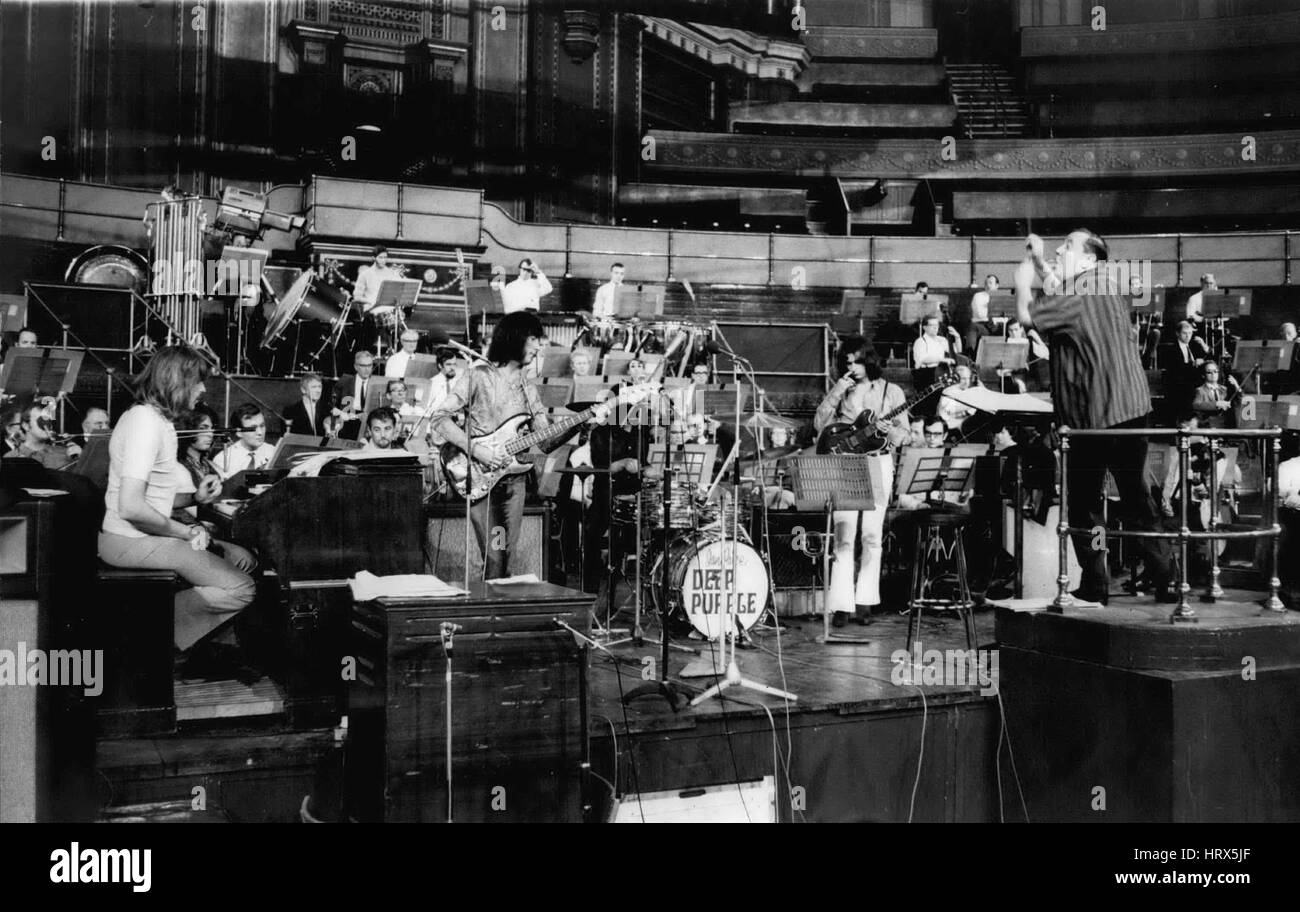 Sep. 24, 1969 - September 24th 1969 Rehearsal for tonightÃ¢â‚¬â„¢s Royal Philharmonic Orchestra and the Deep Purple pop group concert Ã¢â‚¬' The final rehearsal for tonightÃ¢â‚¬â„¢s concert for group and orchestra composed and scored by Jon Lord, the Deep Purple Ã¢â‚¬ËœpopÃ¢â‚¬â„¢ group leader and organist and the Royal Philharmonic Orchestra at the Royal Albert Hall under the conductor Malcolm Arnold. Photo Shows: Malcolm Arnold seen conducting the Royal Philharmonic and the Deep Purple pop group during the rehearsals for this eveningÃ¢â‚¬â„¢s concert. (Credit Image: © Keystone Press Agency Stock Photo