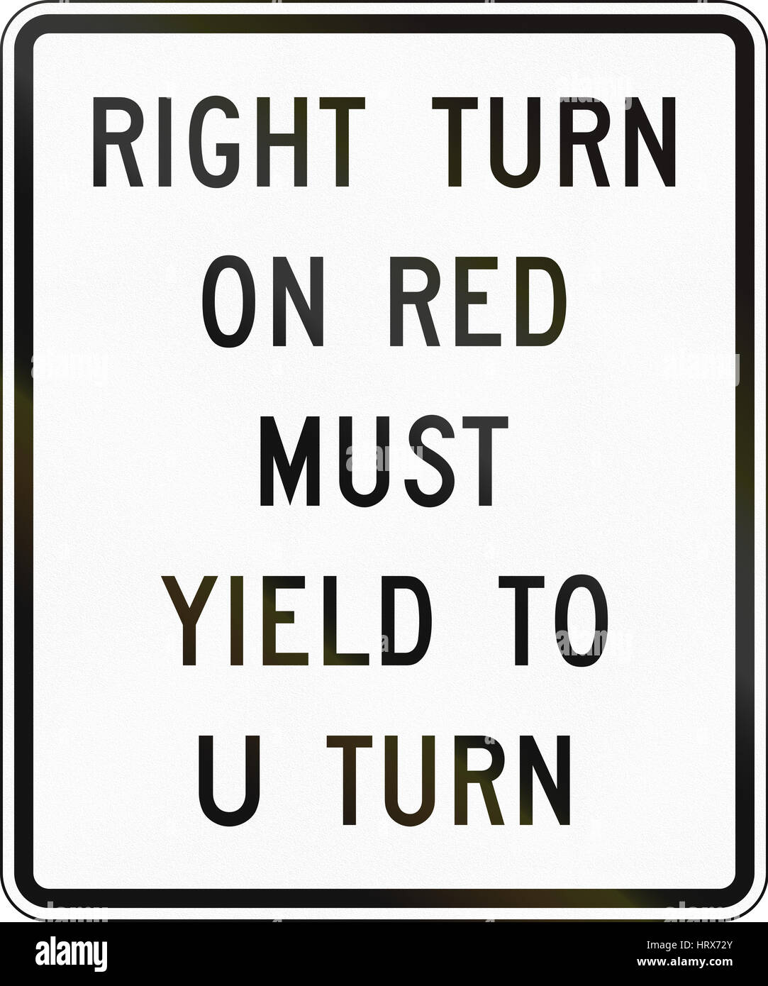 United States MUTCD road sign Right turn on red must yield Stock