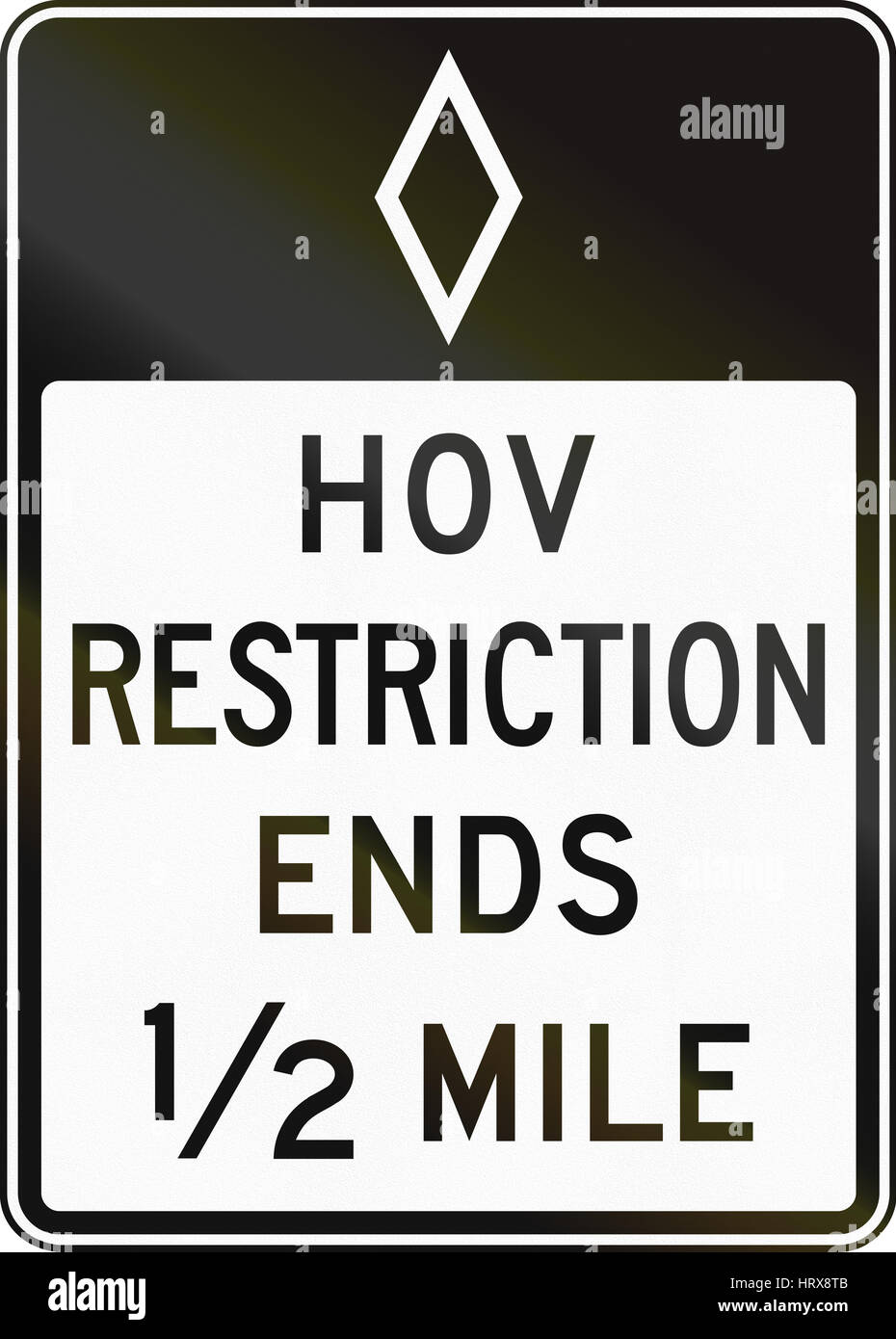 United States MUTCD regulatory road sign - High occupancy vehicle lane ends. Stock Photo