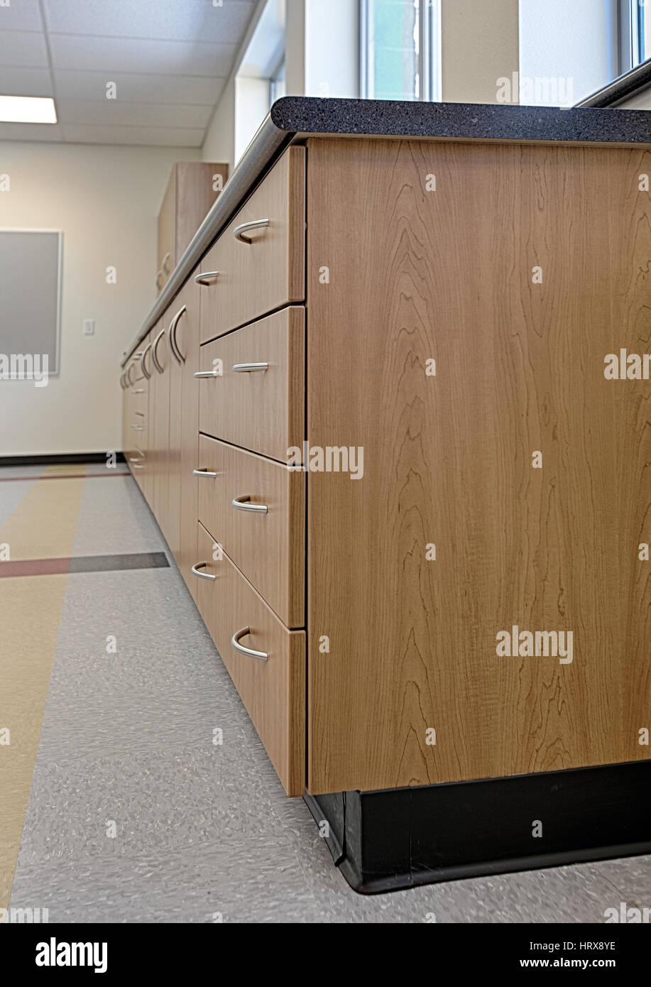 Modern cabinets in a new public elementary school.  The cabinets are designed for long life, high functionality and and  fiscal economy. Stock Photo