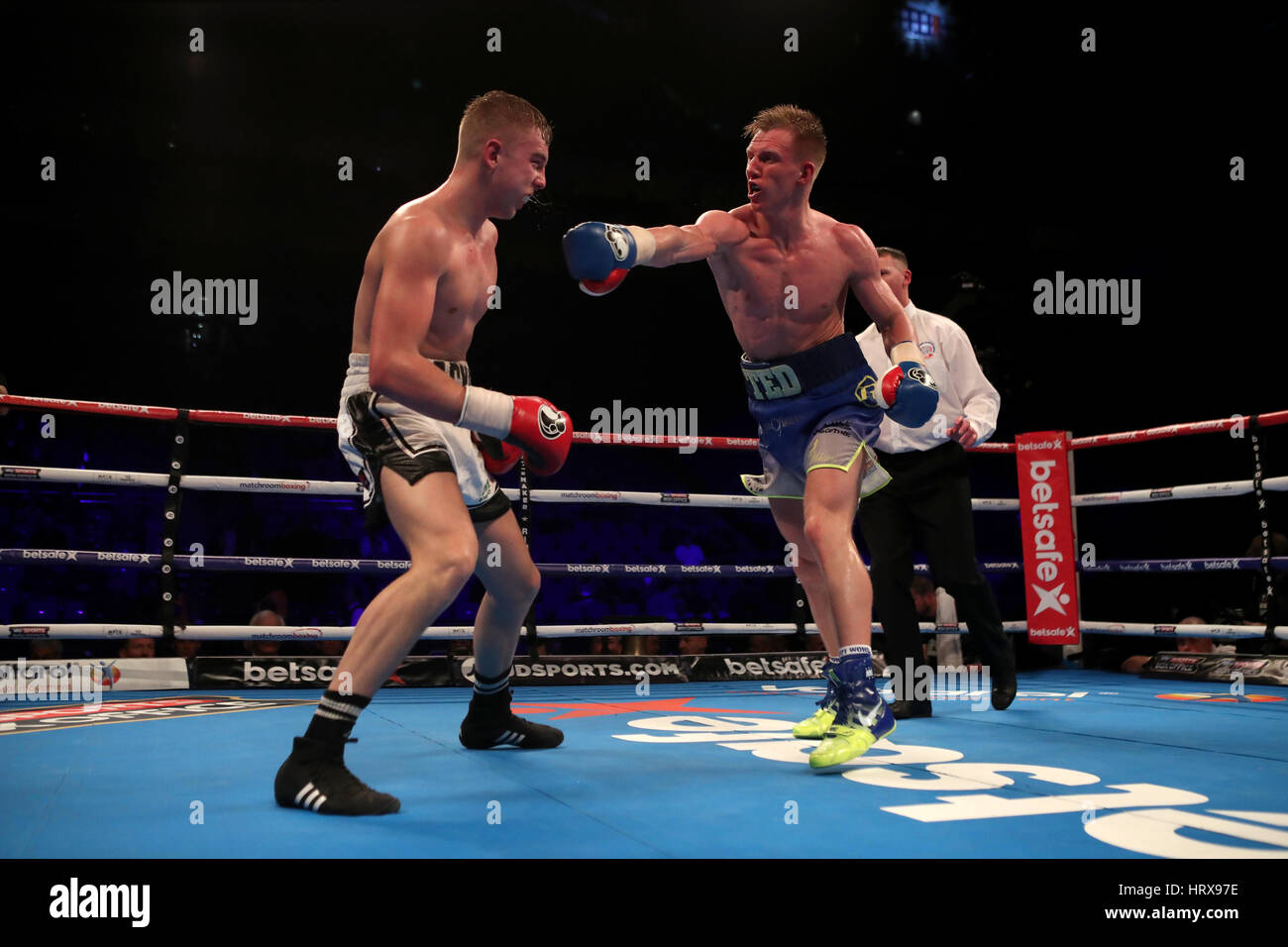 Ted Cheeseman (right) fights Jack Sellars in the Super-Welterweight contest at The O2. Stock Photo
