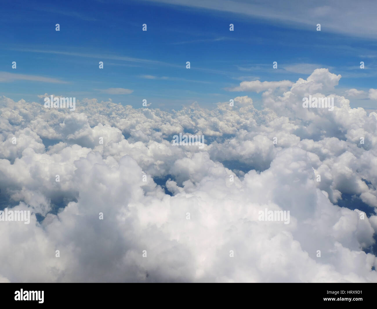 Big white clouds in the blue sky Stock Photo - Alamy