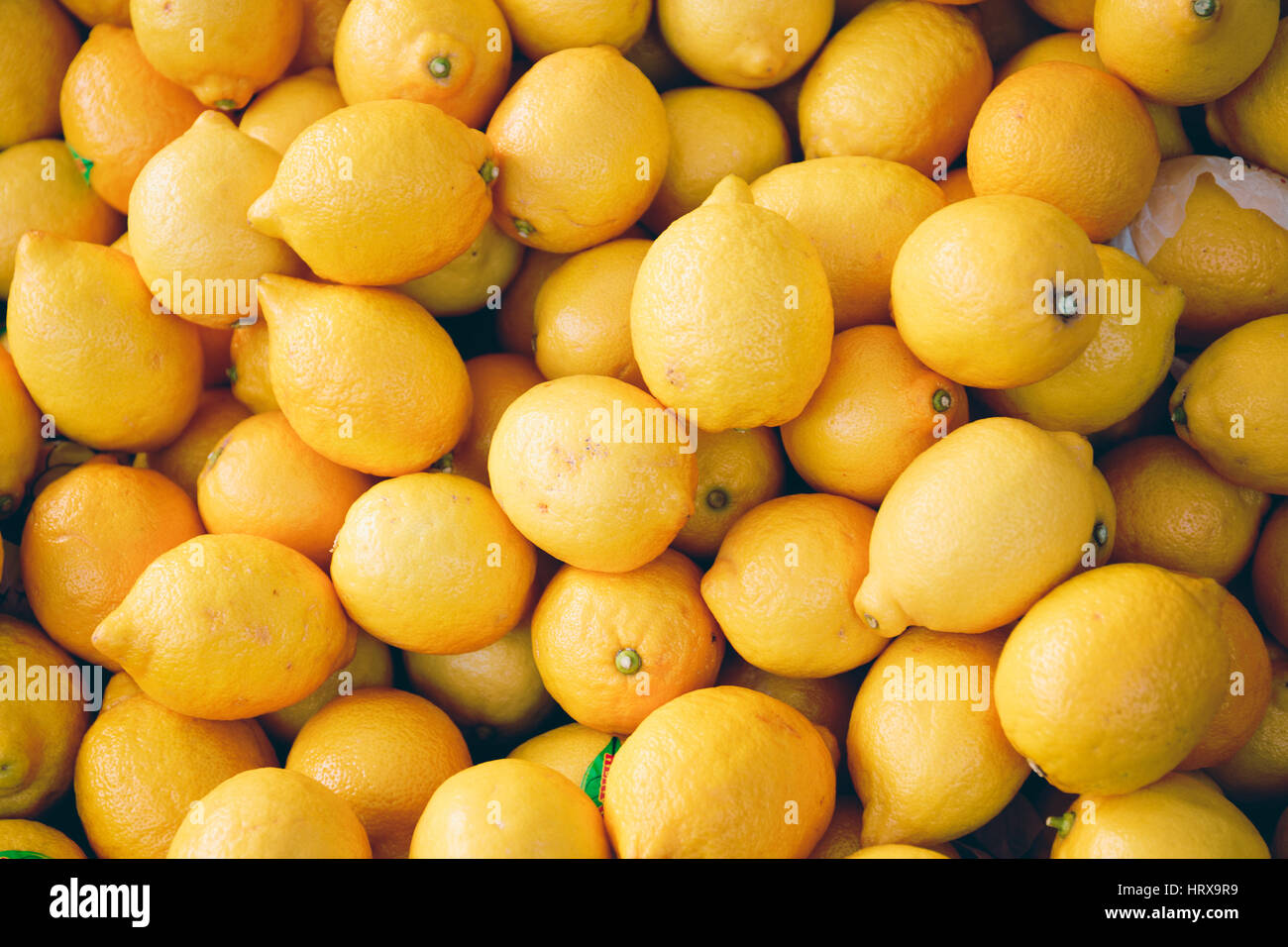 High angle view of a pile of lemons. Traditional food market, León. Spain Stock Photo