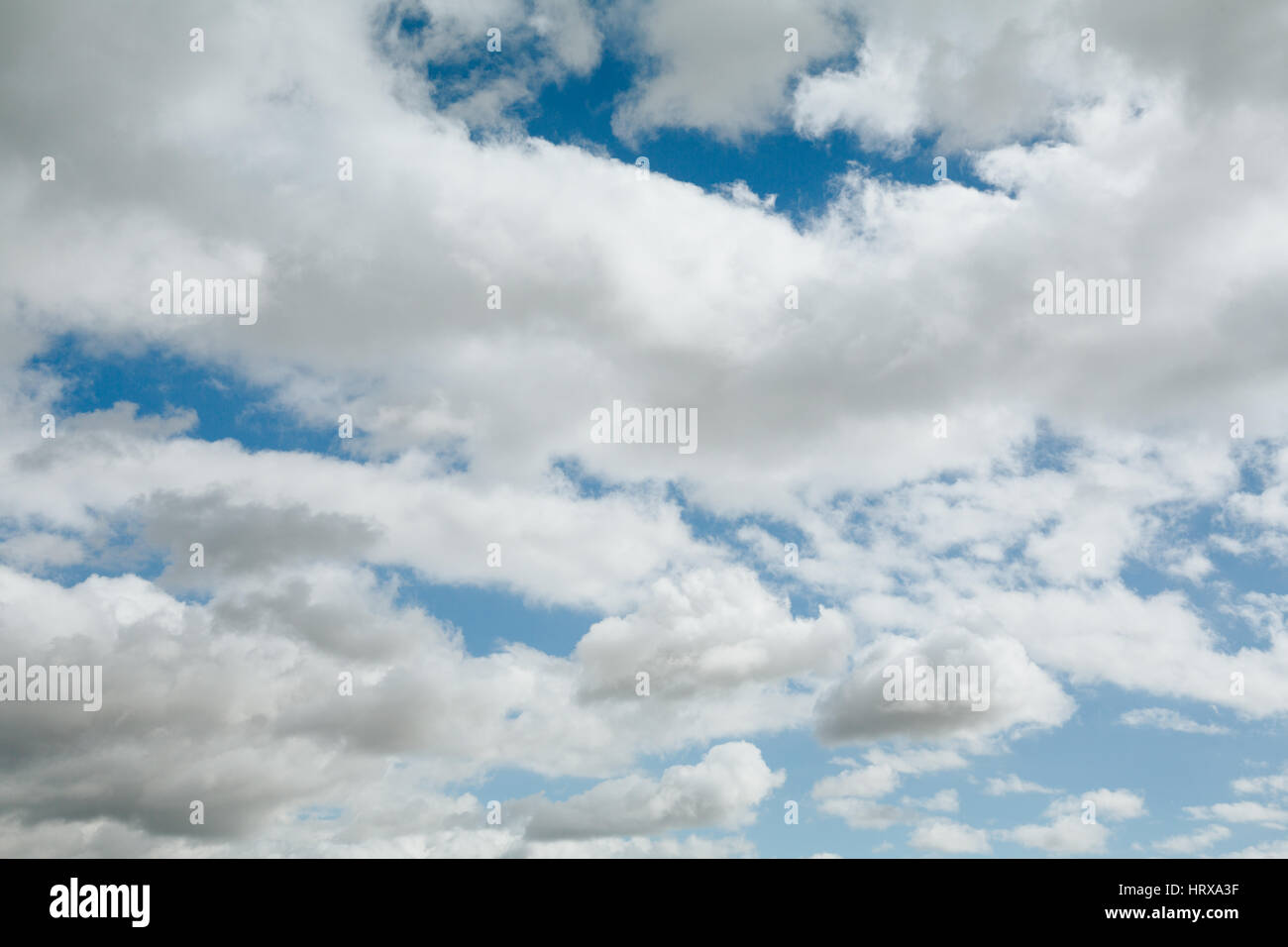 Low angle view of a blue sky with white clouds Stock Photo
