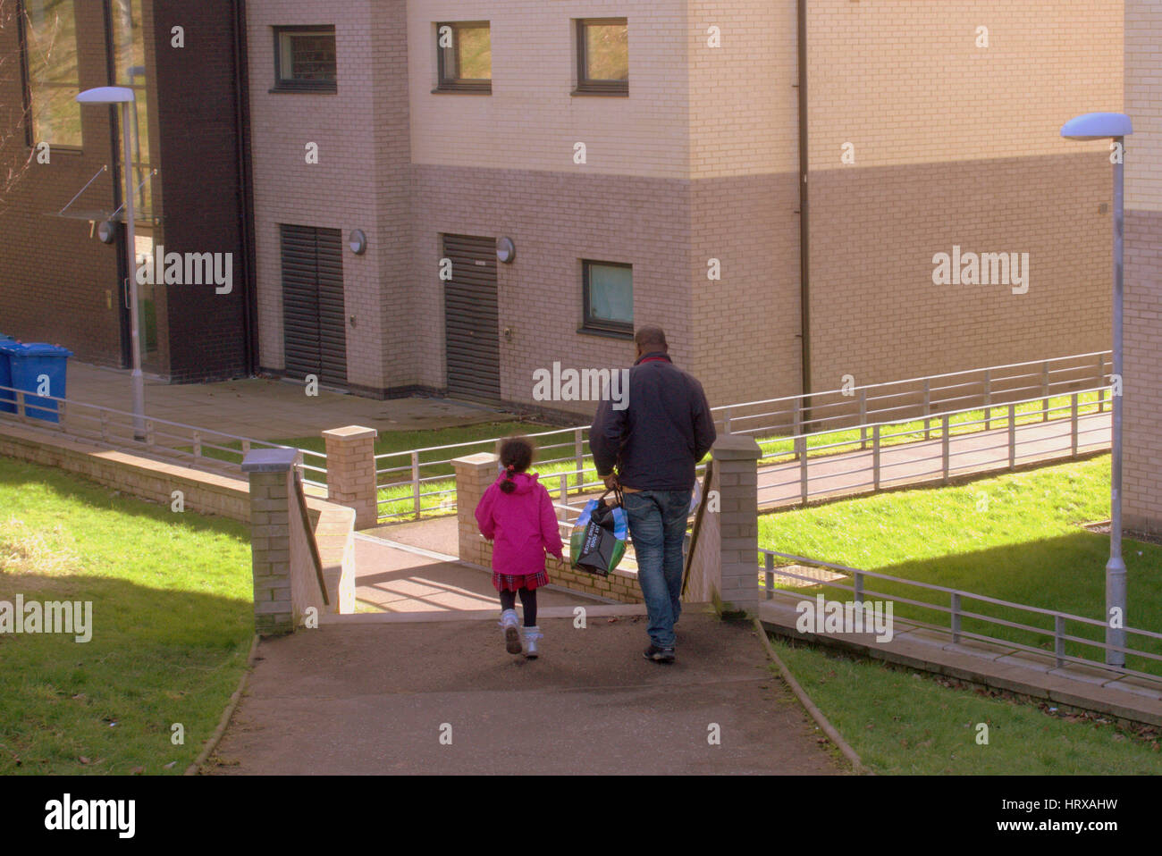 council estate ethnic father and daughter Stock Photo