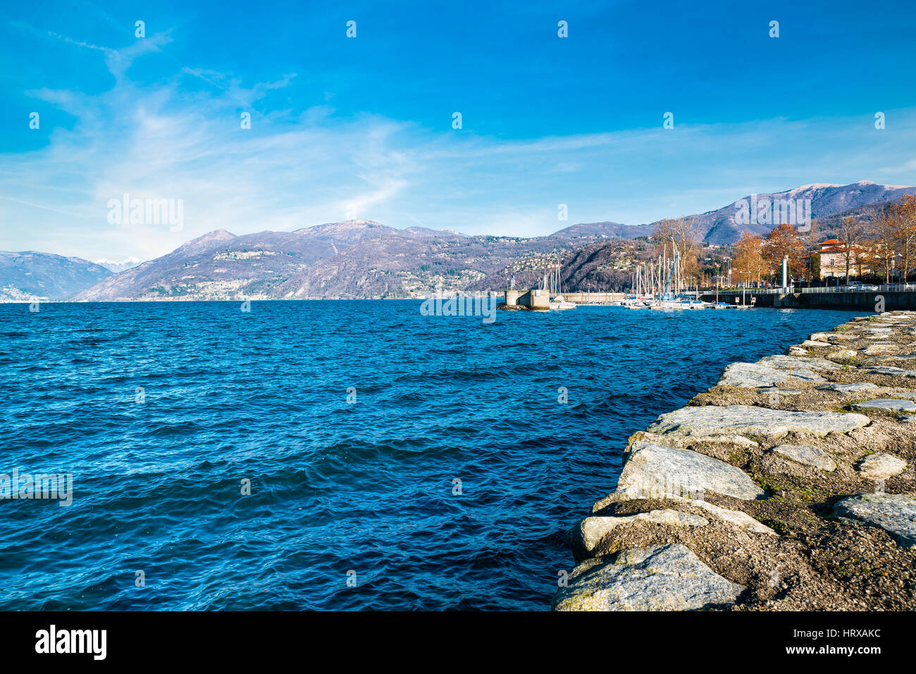 Lake Maggiore, Luino, Italy. View of small village of Luino with its lakeside promenade and the small harbor Stock Photo