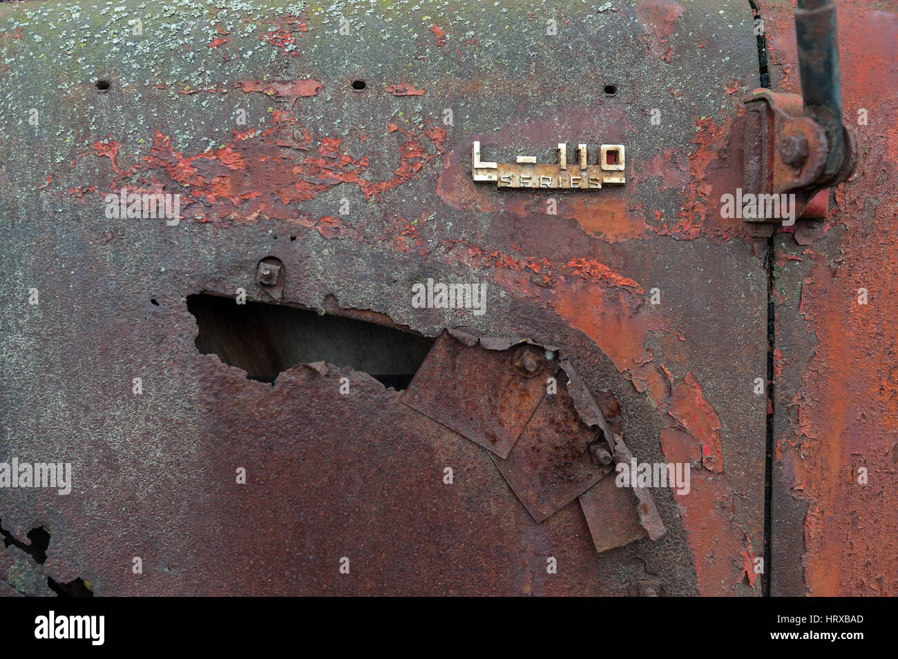 Rusty truck body with hole Stock Photo