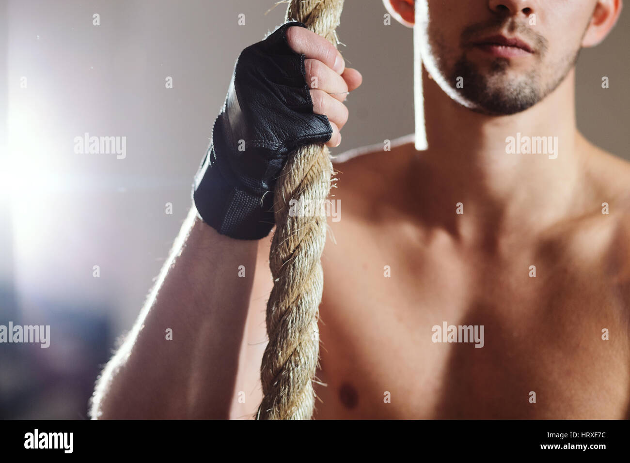 rope climbing workout athlete man in gym Stock Photo Alamy