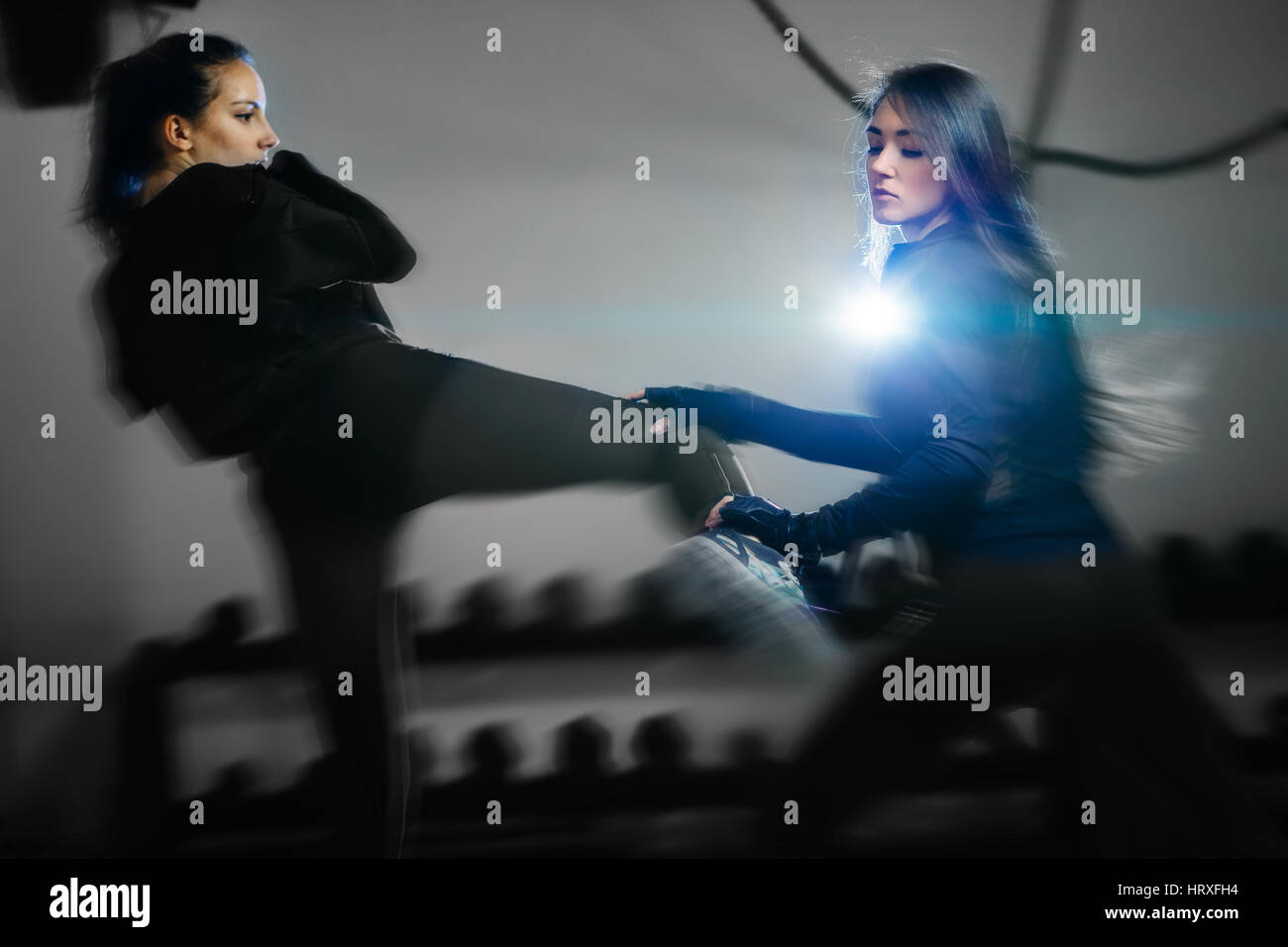 two women fighting in gym. Long hair women fight actively in motion Stock Photo - Alamy two women fighting in gym. Long hair women fight actively in motion Stock Photo - Alamy