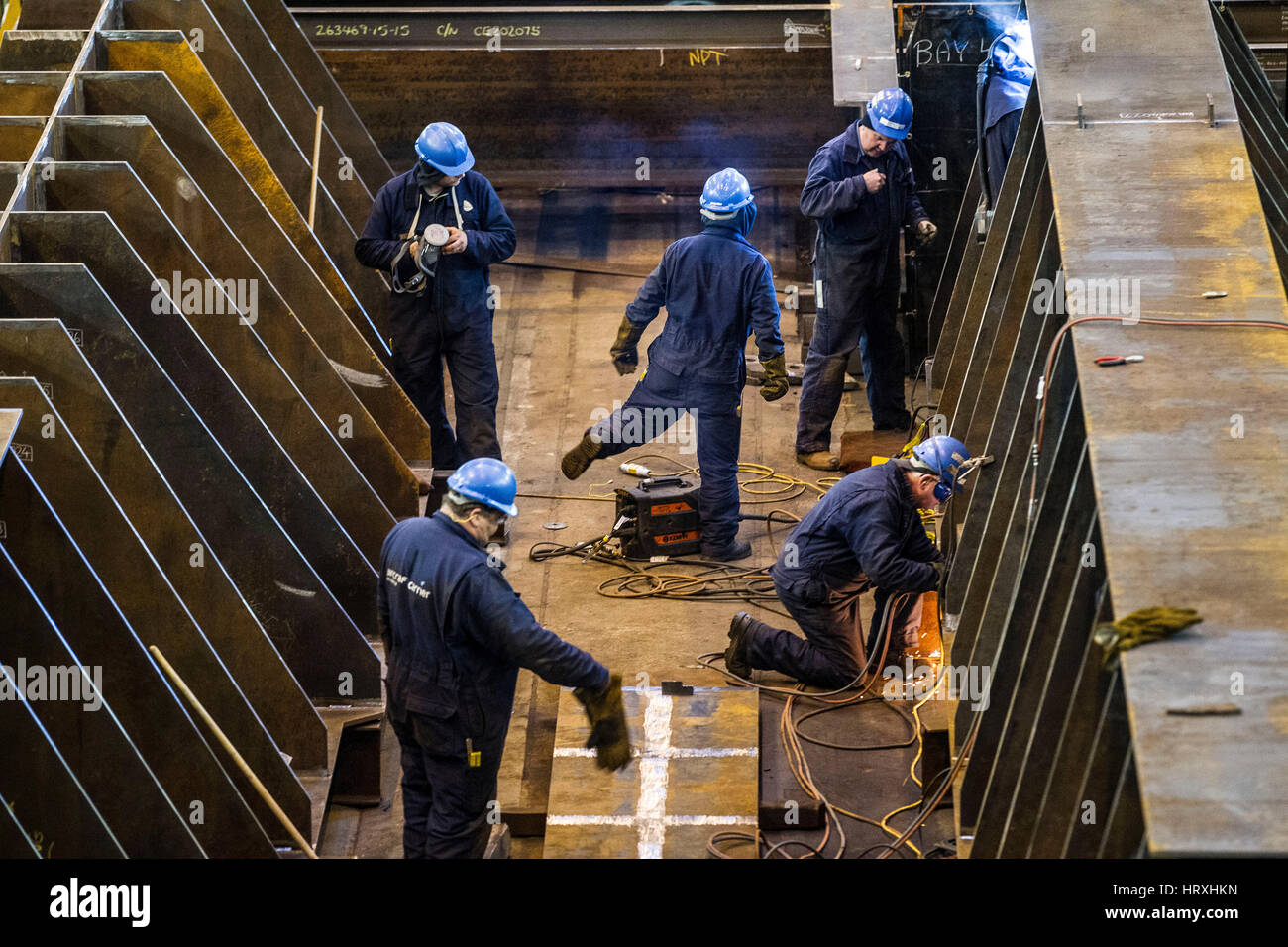 Welders working in heavy industry Stock Photo