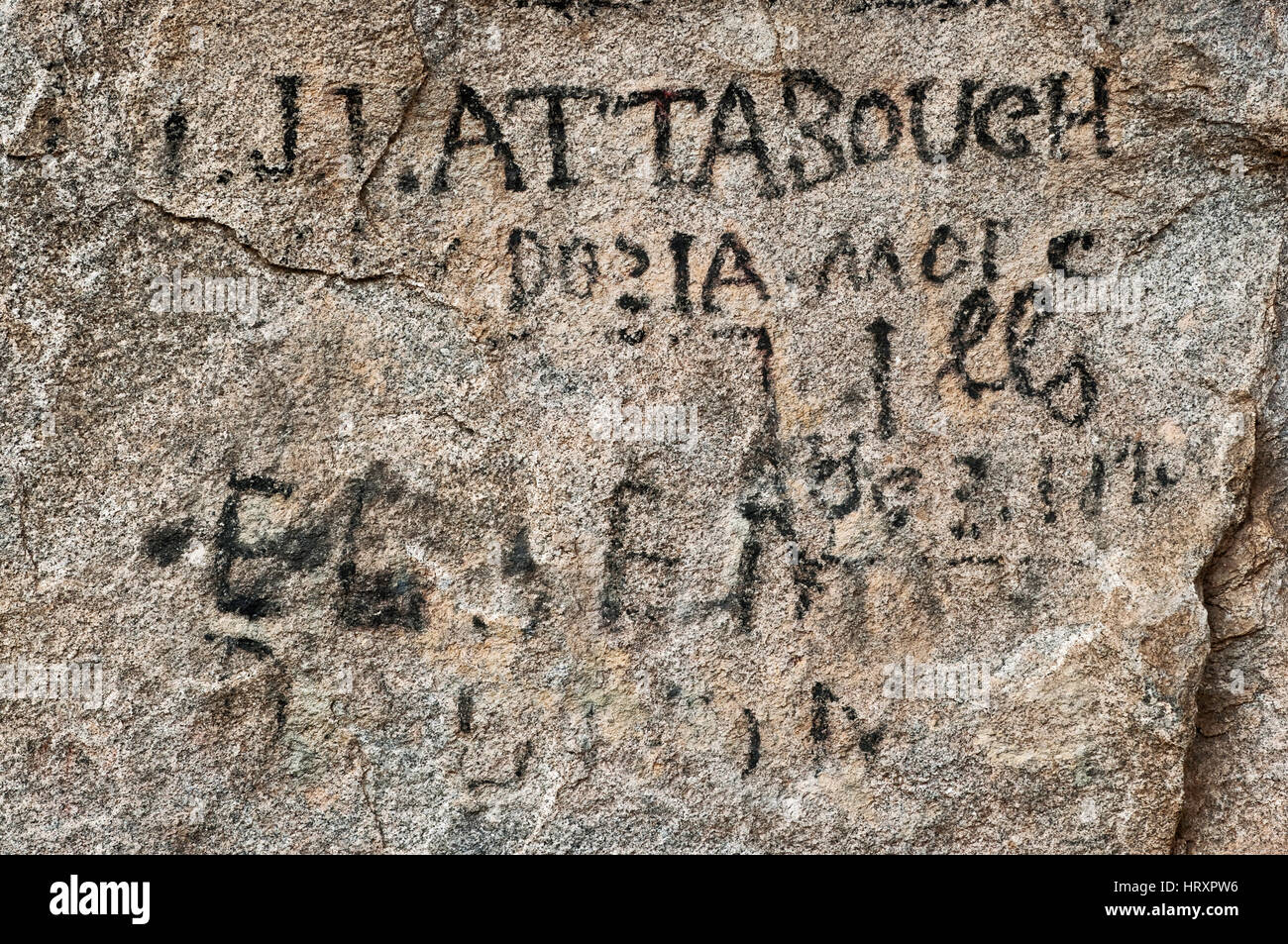 Inscriptions of emigrants traveling in 19th century on California Trail at Register Rock in City of Rocks National Preserve, Idaho, USA Stock Photo