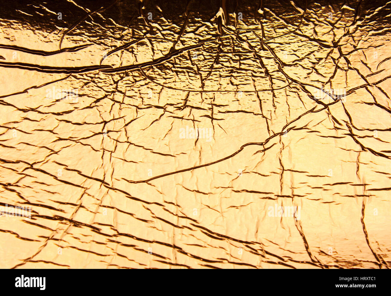 gold brushed metal texture or background. Luxury golden texture.Shiny yellow leaf gold foil texture background Stock Photo