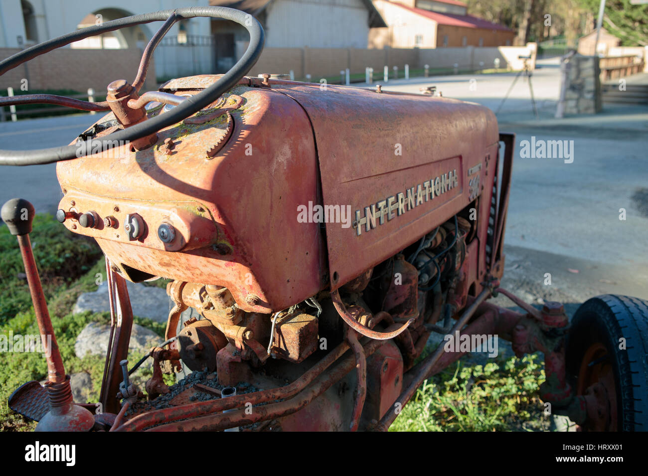 Old red international 300 utility tractor at the Hearst Ranch Winery