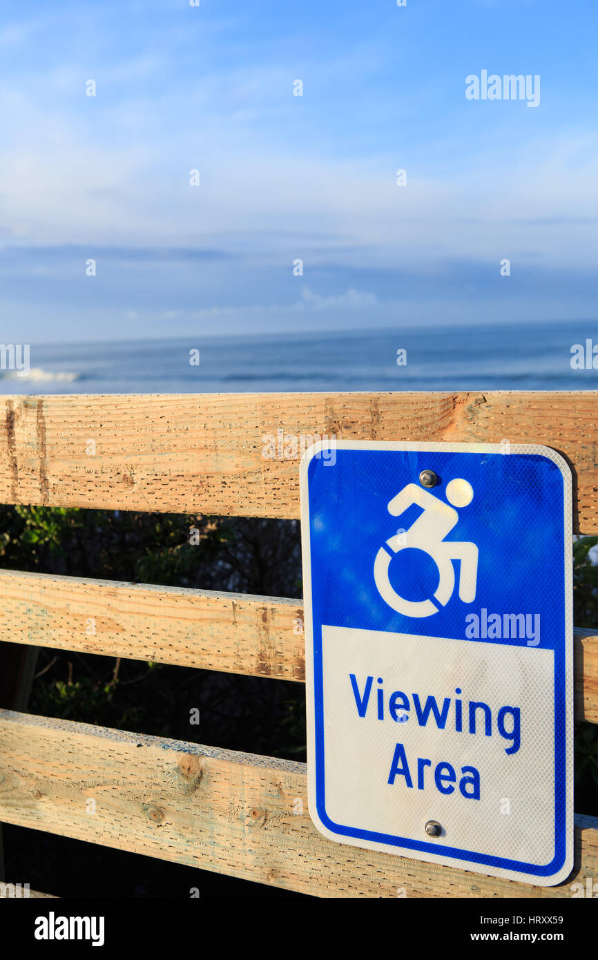 Disabled handicapped wheelchair clifftop viewing area sign on the coast