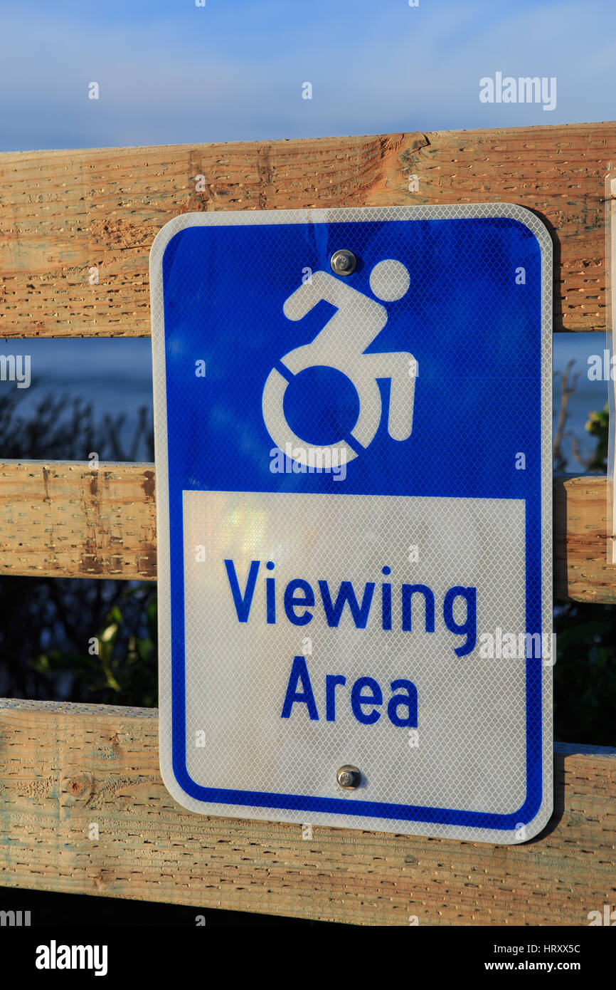 Disabled handicapped wheelchair clifftop viewing area sign on the coast