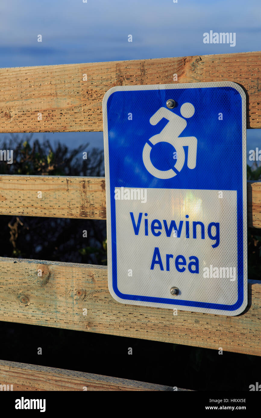 Disabled handicapped wheelchair clifftop viewing area sign on the coast