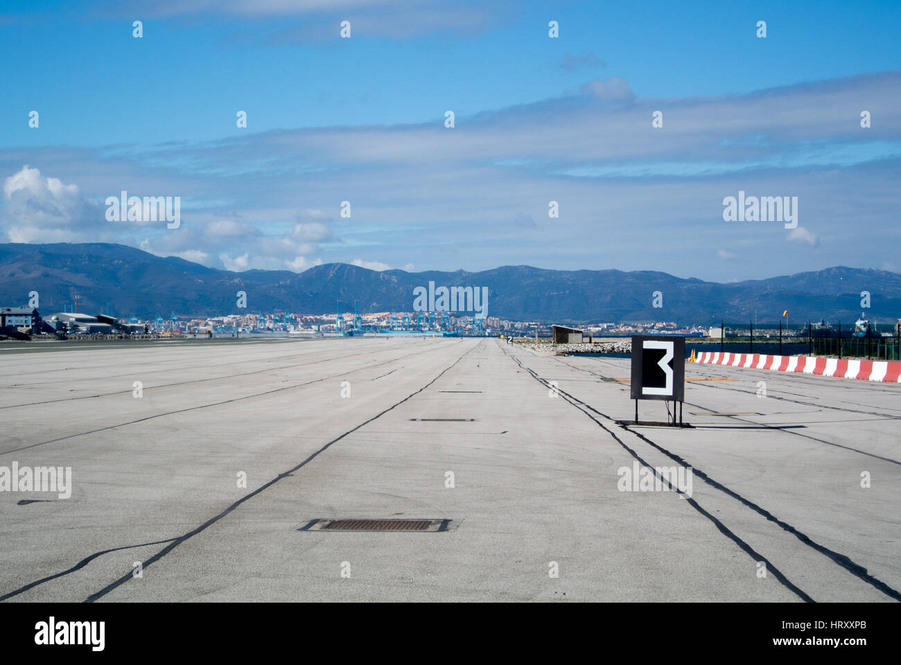 Gibraltar airport runway with mountains on background. Stock Photo