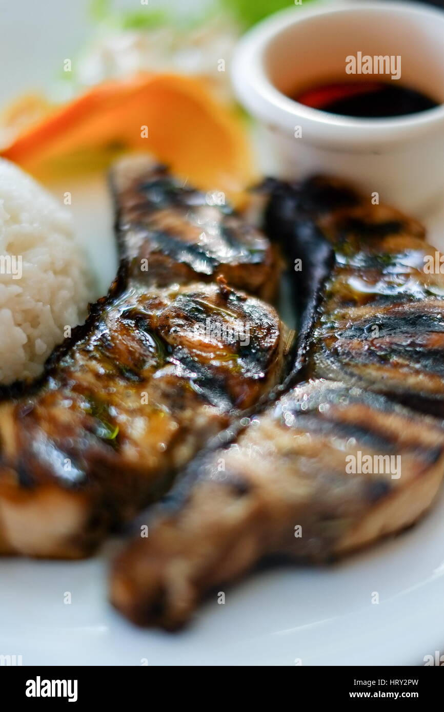 Healthy food ,grilled  fish steak with rice and soy sauce Stock Photo