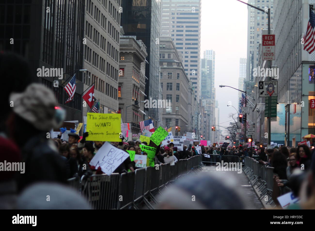 People walking with protest signs hires stock photography and images