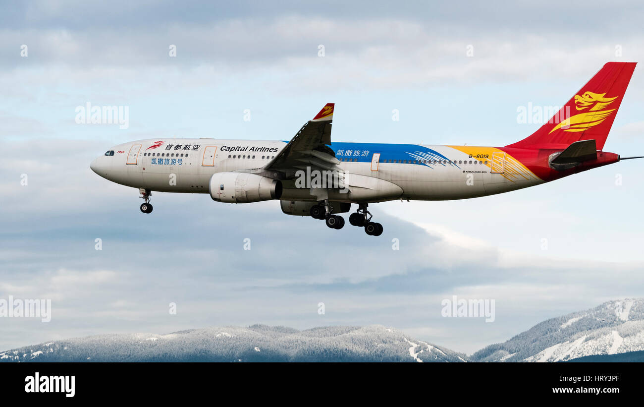 Beijing Capital Airlines plane airplane Airbus A330 (A330-200) wide-body jetliner landing Vancouver International Airport Stock Photo