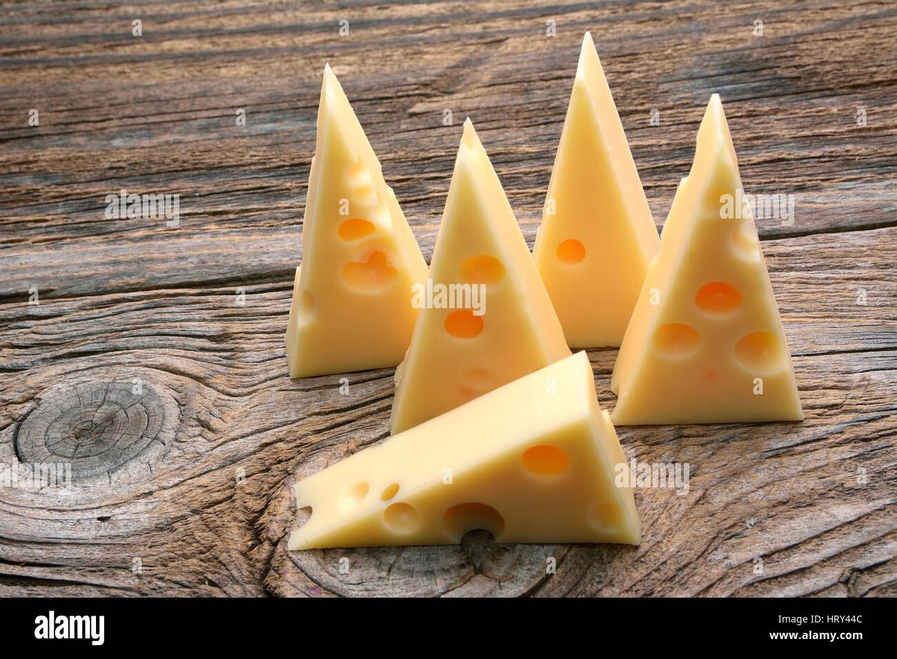 Emmental cheese on the cutting board Stock Photo Alamy