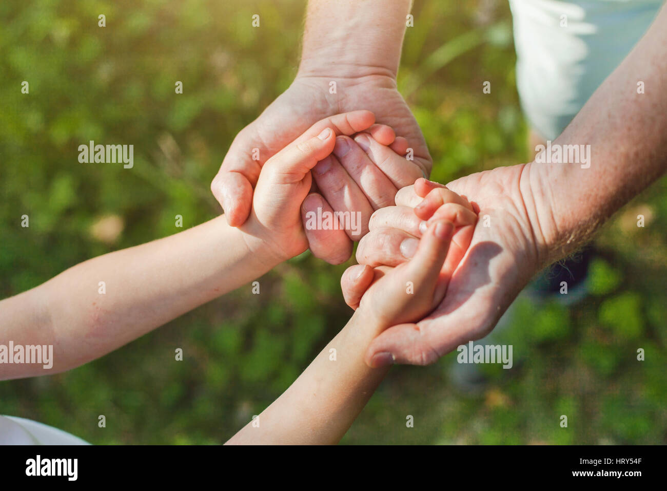 father holding hands of child, parent and kid concept Stock Photo