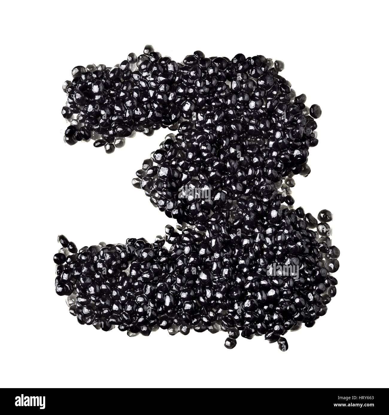 Three - Numbers made from black caviar Stock Photo