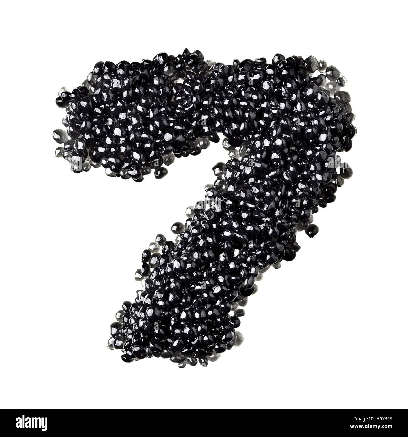 Seven - Numbers made from black caviar Stock Photo