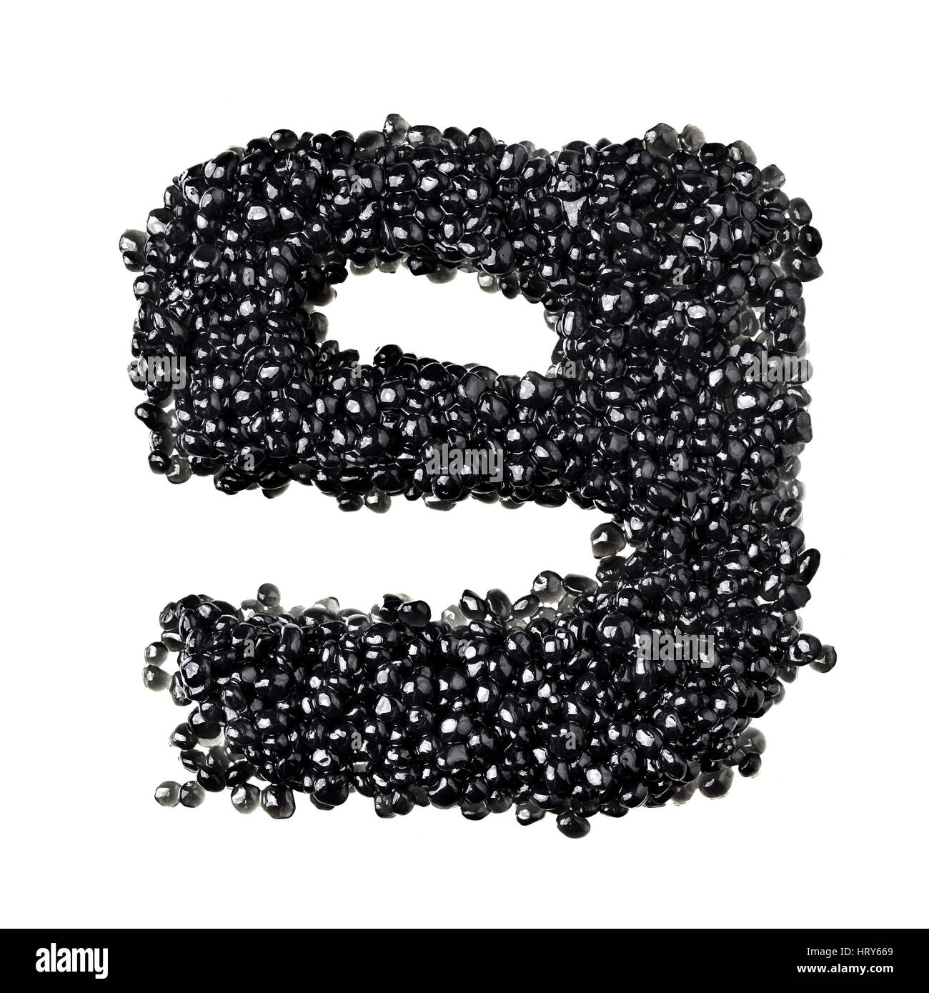 Nine - Numbers made from black caviar Stock Photo