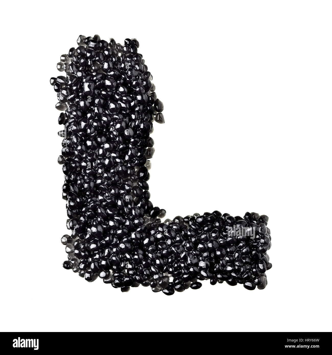 L - Alphabet made from black caviar Stock Photo